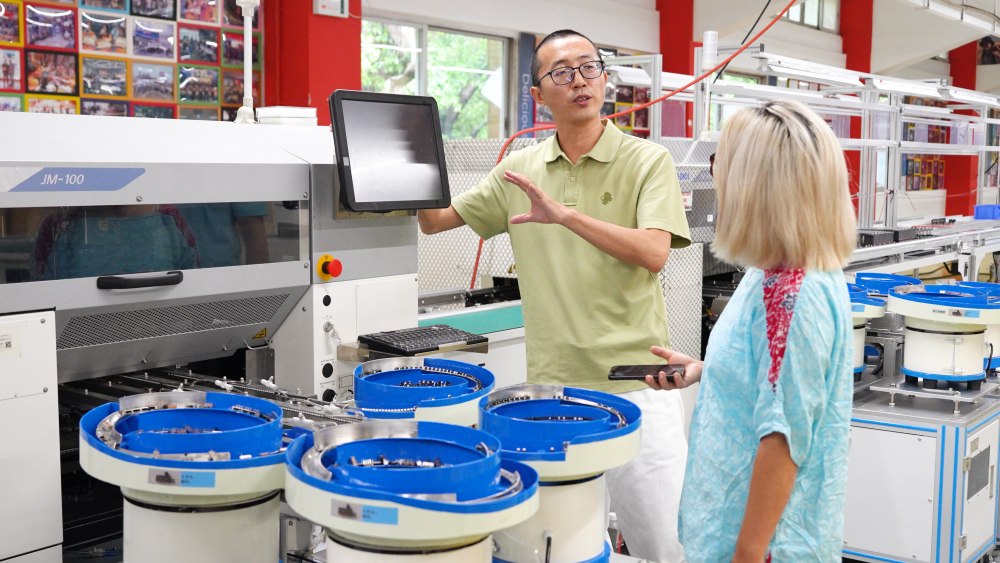 Wall Street Journal journalist visits I.C.T factory for electronics manufacturing interview 01.jpg